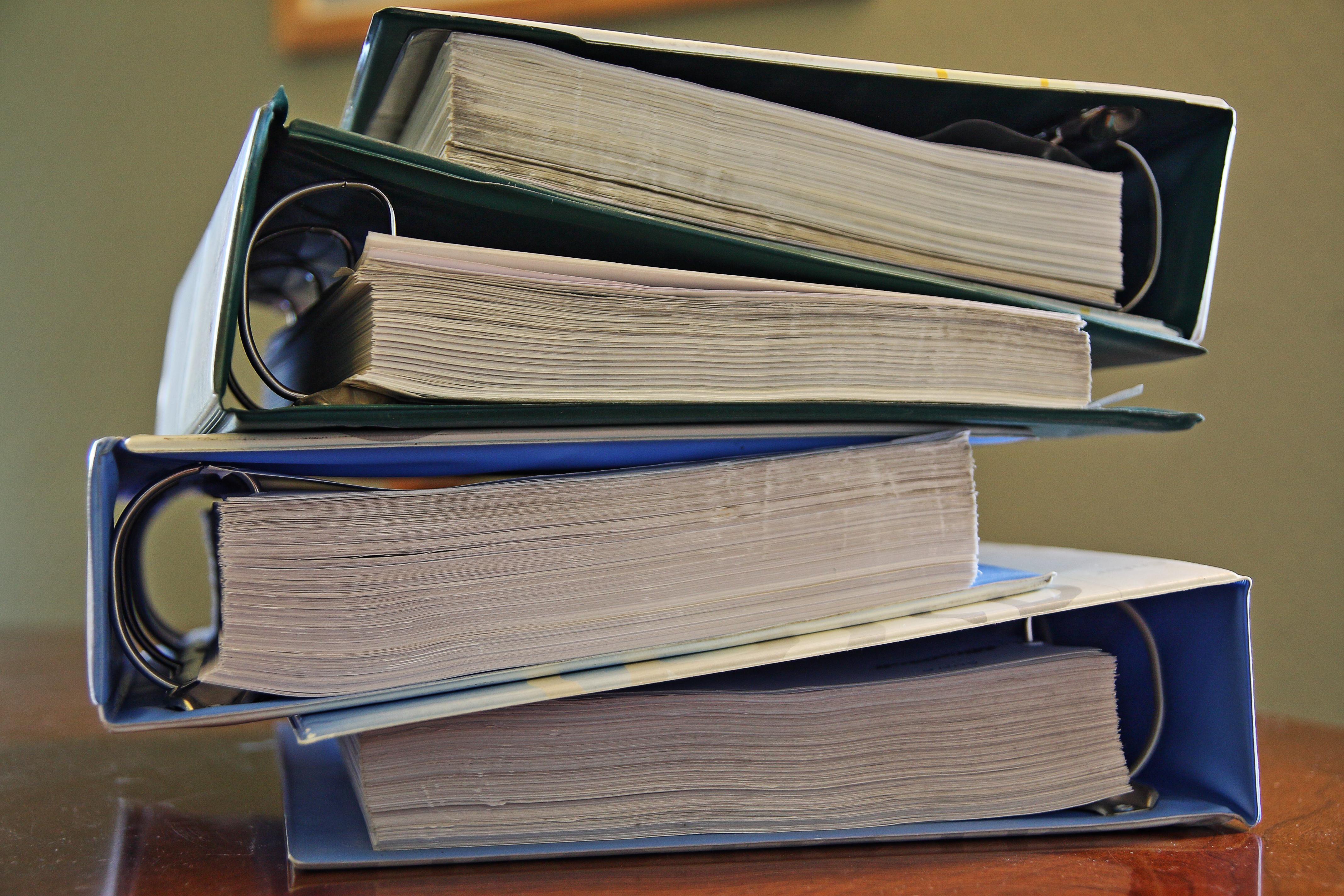 A set of binders, illustrating documented procedures